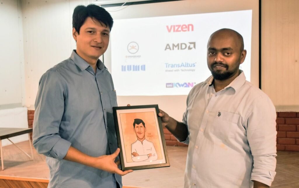 Prabuddha Vyas holding a portrait